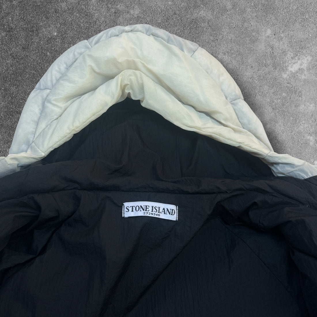 Stone Island neck label inside a hood