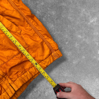Stone Island SS 2008 Superlight Resined Nylon Hooded Jacket, Drawstring hood. Full zip fastening with storm flap. Two diagonal front pockets with hidden snap fastening. Elasticated cuffs and hem. Mesh badge. Orange, xxl but fits xl to

ART. 48154833/1453