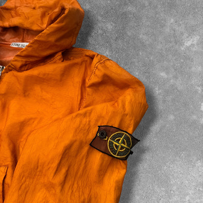 Stone Island SS 2008 Superlight Resined Nylon Hooded Jacket, Drawstring hood. Full zip fastening with storm flap. Two diagonal front pockets with hidden snap fastening. Elasticated cuffs and hem. Mesh badge. Orange, xxl but fits xl to

ART. 48154833/1453