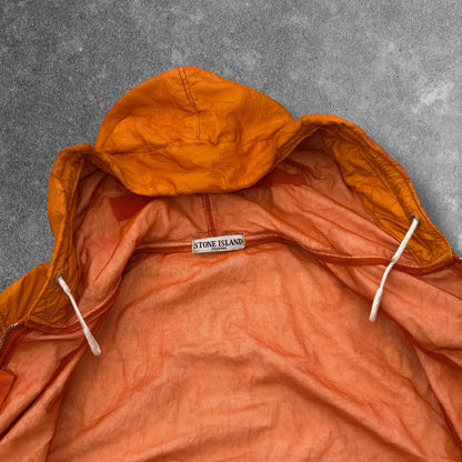 Stone Island SS 2008 Superlight Resined Nylon Hooded Jacket, Drawstring hood. Full zip fastening with storm flap. Two diagonal front pockets with hidden snap fastening. Elasticated cuffs and hem. Mesh badge. Orange, xxl but fits xl to

ART. 48154833/1453