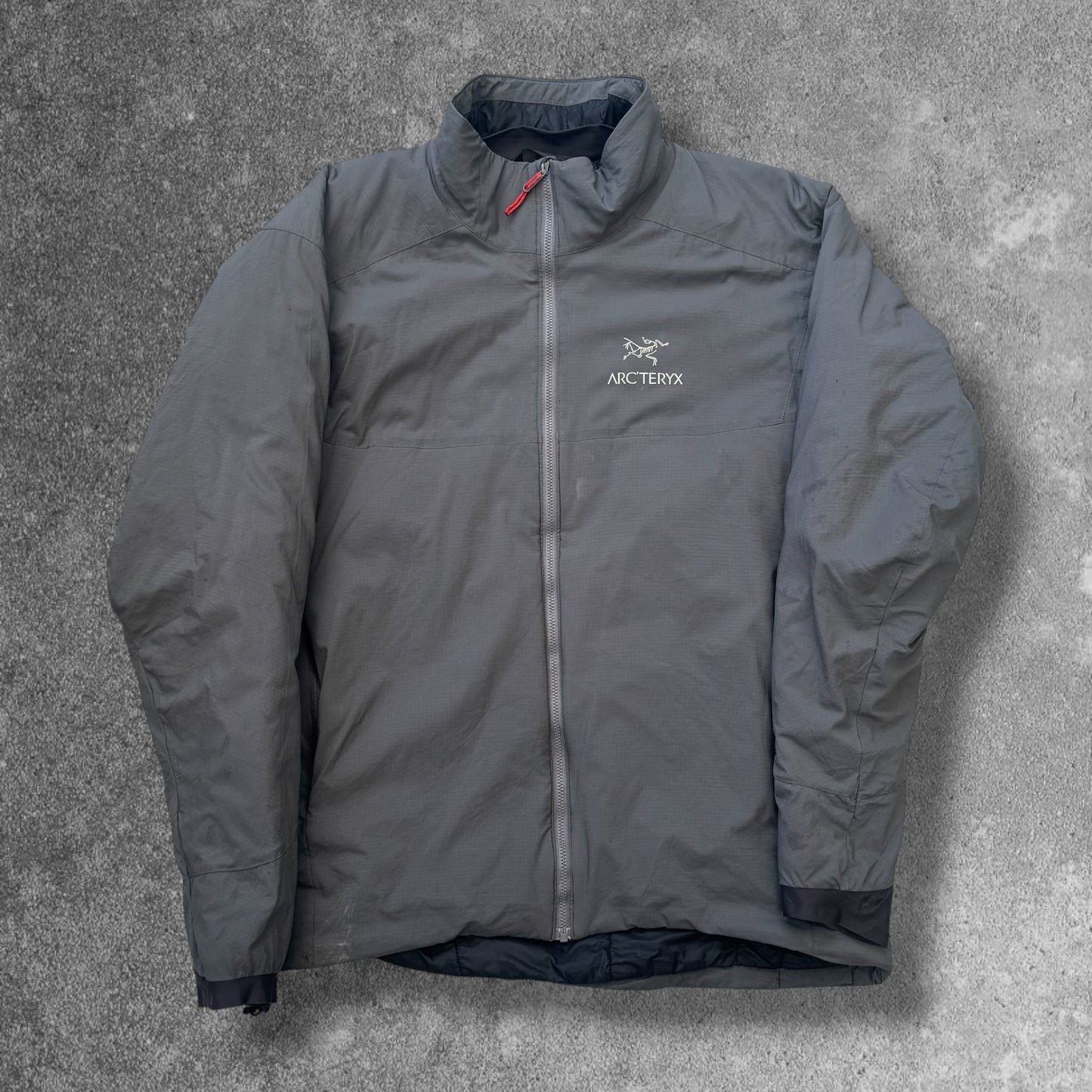 Arc atom ar jacket few minor Knicks and marks but could do with a wash  men’s large neck tag faded but can still see large