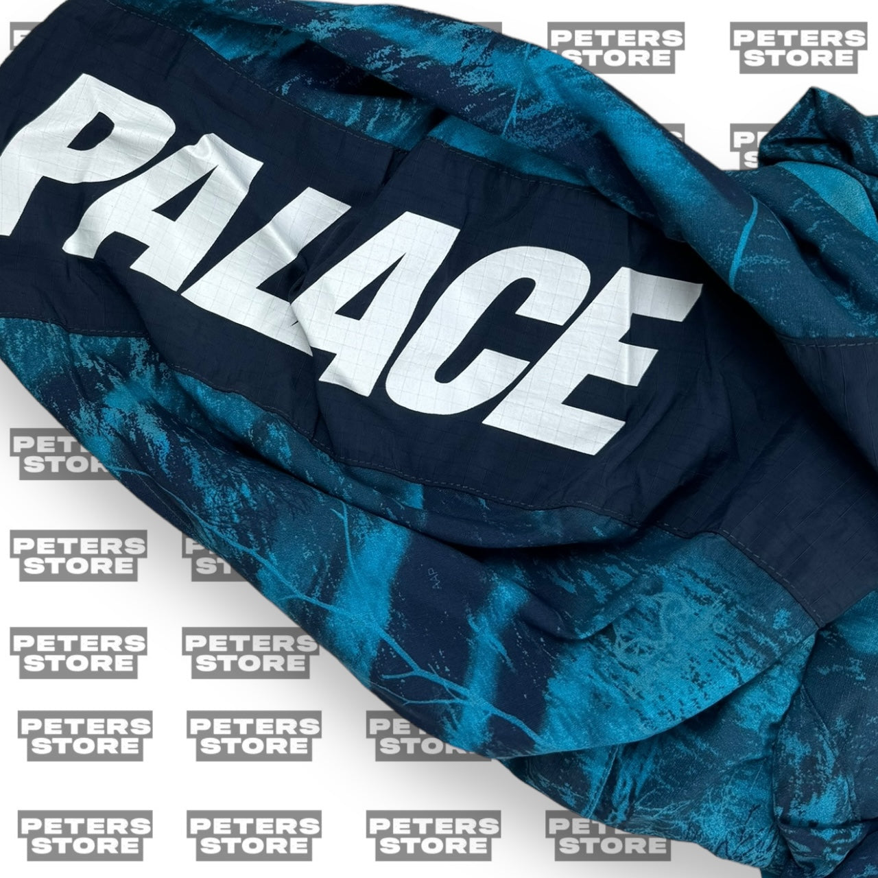 PALACE ASYMETRIC REAL TREE SHELL TOP BLUE