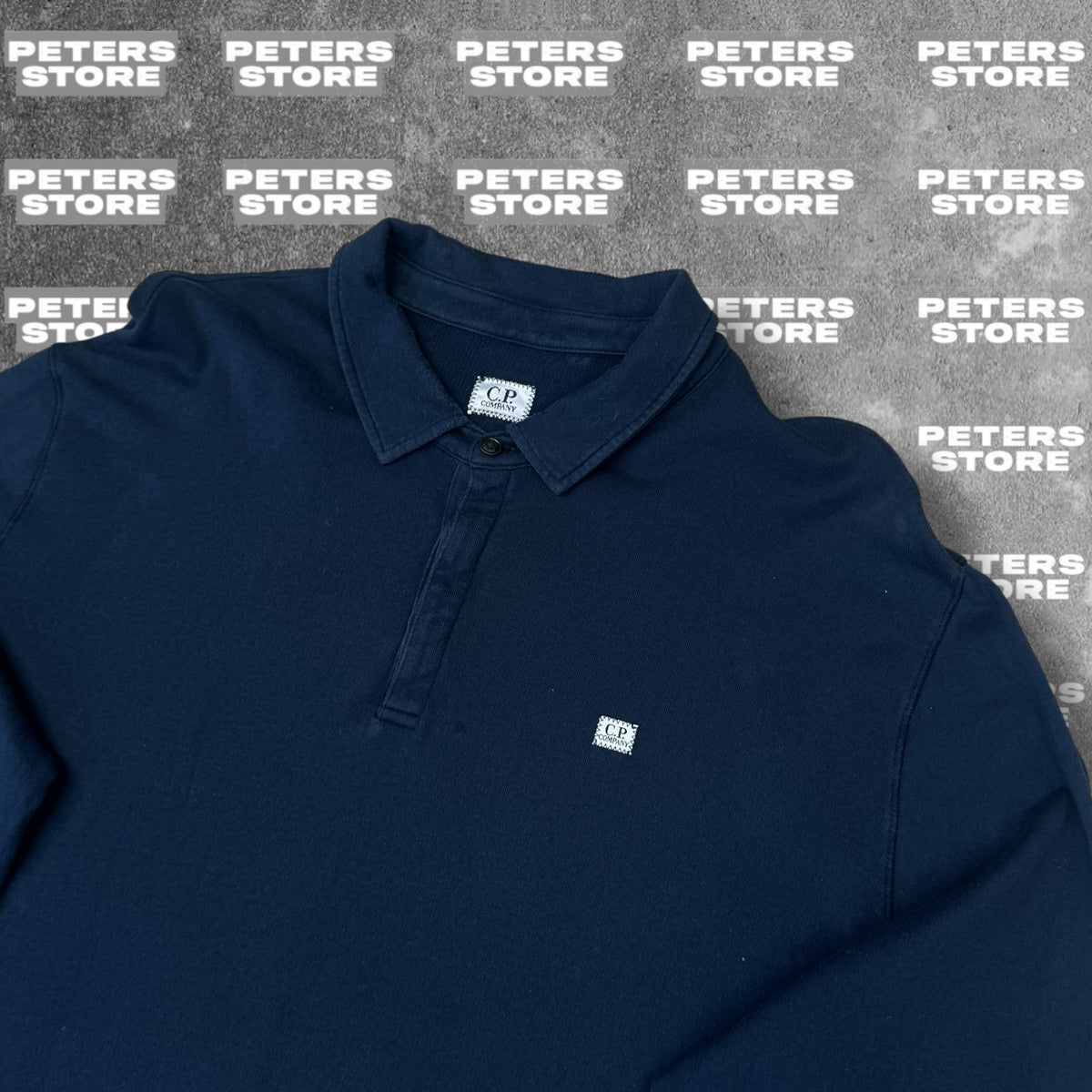 C.P. Company Long Sleeve Polo Navy close up