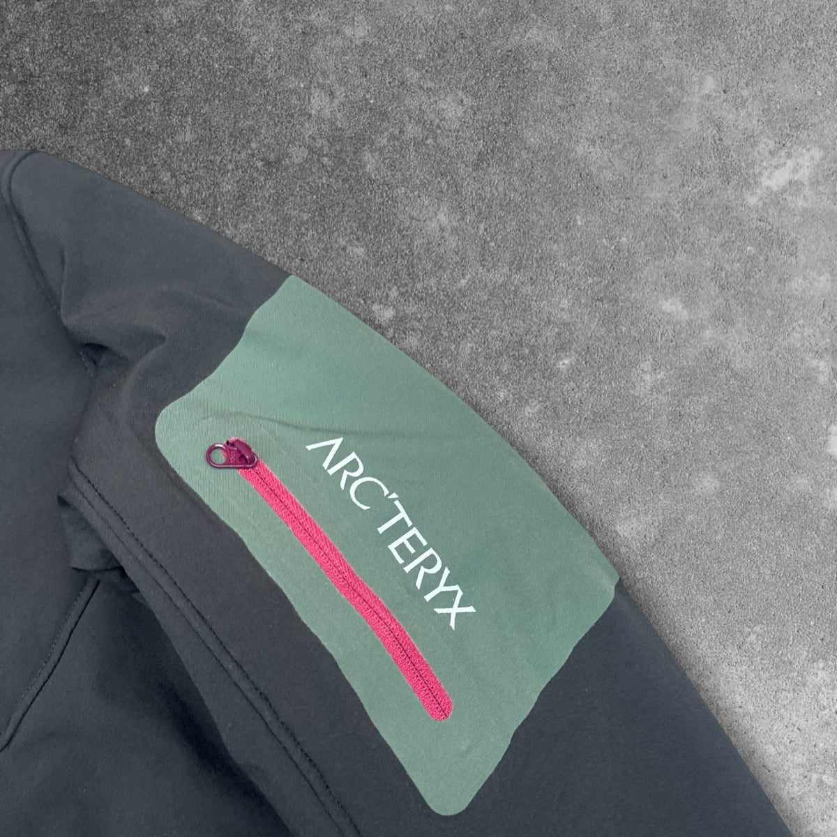 Arc'teryx Softshell sleeve pocket and logo